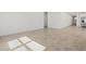 Open living room featuring neutral tile flooring and abundant natural light at 3806 N Camden Dr, Florence, AZ 85132
