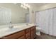 Bathroom featuring dual sinks, modern fixtures, and a clean, well-maintained design at 3935 E Blue Spruce Ln, Gilbert, AZ 85298