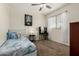 Comfortable bedroom with carpet, stylish decor, natural light, and functional furnishings at 3935 E Blue Spruce Ln, Gilbert, AZ 85298