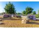 Community playground with climbing structure, playhouse, and ample space for children to play and explore at 3935 E Blue Spruce Ln, Gilbert, AZ 85298