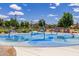 Community splash pad featuring colorful water features, providing a fun and refreshing recreational area for residents at 3935 E Blue Spruce Ln, Gilbert, AZ 85298