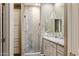 Beautiful bathroom with a glass-enclosed shower, granite counters, and dual sinks, offering luxury and convenience at 3935 E Rough Rider Rd # 1368, Phoenix, AZ 85050