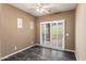 Bedroom with sliding door leading to balcony and shutters on the windows to control light at 3935 E Rough Rider Rd # 1368, Phoenix, AZ 85050