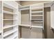 Walk-in closet with custom shelving and ample storage space at 3935 E Rough Rider Rd # 1368, Phoenix, AZ 85050