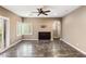 Bright living room with tile floors, ceiling fan, and access to outdoor at 3935 E Rough Rider Rd # 1368, Phoenix, AZ 85050