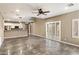 Open-concept living room boasts modern flooring and a seamless flow to the kitchen, perfect for entertaining at 3935 E Rough Rider Rd # 1368, Phoenix, AZ 85050
