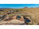 Picture of a desert home that features a private pool and solar panels on a red-tiled roof at 42943 N Livingstone Way, Anthem, AZ 85086