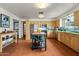 Well-equipped kitchen featuring ample counter space, stainless steel appliances, and a functional island for cooking and dining at 4308 E Montecito Ave, Phoenix, AZ 85018