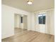 Bright bedroom features wood floors, a large closet, neutral paint, and natural light from window at 4731 E Monte Vista Rd, Phoenix, AZ 85008
