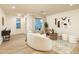 Cozy living room with comfortable seating, stylish decor, and plenty of natural light at 4731 E Monte Vista Rd, Phoenix, AZ 85008