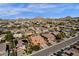 Panoramic aerial view of a residential community featuring desert landscape and mountain views at 5032 W Yearling Rd, Phoenix, AZ 85083