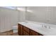 Bathroom featuring double sinks with updated fixtures and wood cabinets at 5032 W Yearling Rd, Phoenix, AZ 85083
