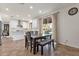 Eat in dining area features tile flooring and a sliding glass door to the outside at 5032 W Yearling Rd, Phoenix, AZ 85083