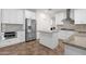 Modern kitchen with stainless steel appliances, granite countertops, and tile flooring at 5032 W Yearling Rd, Phoenix, AZ 85083