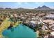 Community with large ponds, walking paths, and golf course in the distance at 5124 N 31St Pl # 536, Phoenix, AZ 85016