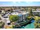 Aerial view of a lakeside condo complex featuring well-maintained landscaping and mature trees at 5124 N 31St Pl # 536, Phoenix, AZ 85016