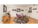 Bright dining room with a glass table, colorful rug, and modern decor at 5124 N 31St Pl # 536, Phoenix, AZ 85016