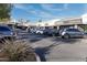 Commercial strip mall shops include eateries, and services; well-maintained parking area on a sunny day at 5124 N 31St Pl # 536, Phoenix, AZ 85016