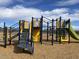 Playground with modern climbing equipment, slides and swings with wood chip ground cover at 5515 W Hopi Trl, Laveen, AZ 85339