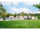 Lush backyard featuring a sparkling pool, inviting hot tub, and comfortable lounge seating, perfect for relaxing and entertaining outdoors at 5532 E Crocus Dr, Scottsdale, AZ 85254