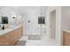 Elegant bathroom showcases a spacious walk-in shower, soaking tub, custom vanity, and stylish fixtures for spa-like comfort at 5532 E Crocus Dr, Scottsdale, AZ 85254