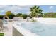 Inviting hot tub with a clear view of the sparkling pool and lush landscaping, perfect for relaxation and enjoying the outdoors at 5532 E Crocus Dr, Scottsdale, AZ 85254