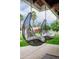 Stylish outdoor seating area with comfortable hanging chairs, perfect for relaxing and enjoying the beautiful surroundings at 5532 E Crocus Dr, Scottsdale, AZ 85254