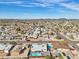 Scenic aerial view of a residential neighborhood featuring single-Gathering homes, pools and desert landscaping at 6123 W Karen Lee Ln, Glendale, AZ 85306