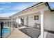 Cozy backyard patio featuring a shaded area, comfortable seating, and access to the pool at 6123 W Karen Lee Ln, Glendale, AZ 85306