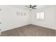 Bedroom with a ceiling fan, carpeted floors, freshly painted walls, and a bright window at 623 W Guadalupe Rd # 228, Mesa, AZ 85210