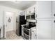 This remodeled kitchen features stainless steel appliances and white subway tile backsplash at 623 W Guadalupe Rd # 228, Mesa, AZ 85210
