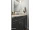 Stylish bathroom vanity with granite countertop, modern fixtures, and neutral tones at 6845 E Osborn Rd # D, Scottsdale, AZ 85251