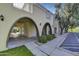 The exterior view showcases the building's design, landscaping, and well-maintained grounds at 6845 E Osborn Rd # D, Scottsdale, AZ 85251