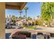 Beautifully landscaped complex featuring lush vegetation and designated parking at 6885 E Cochise Rd # 235, Paradise Valley, AZ 85253