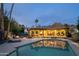 Inviting backyard with a sparkling pool, outdoor lounge area, and stunning mountain views at 7508 N 21St St, Phoenix, AZ 85020