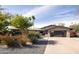 Stunning home with a spacious driveway, lush greenery, and desert landscaping at 7508 N 21St St, Phoenix, AZ 85020