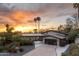 Beautiful contemporary home featuring lush landscaping and a modern, spacious driveway at 7508 N 21St St, Phoenix, AZ 85020