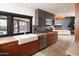 Stylish kitchen with modern appliances, sleek cabinets, and a view to the patio at 7508 N 21St St, Phoenix, AZ 85020