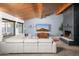 Cozy living room with a modern fireplace, plush sofa, and stylish decor at 7508 N 21St St, Phoenix, AZ 85020