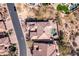 Overhead shot of a well-maintained roof with a backyard oasis and an inviting pool at 8041 E Teton Cir, Mesa, AZ 85207