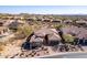 Beautiful desert home with mature landscaping, complementing its natural surroundings at 8041 E Teton Cir, Mesa, AZ 85207