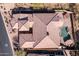 Bird's eye view of a beautiful property featuring a luxurious pool and desert landscaping at 8041 E Teton Cir, Mesa, AZ 85207