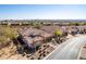 Lovely home with a tile roof, desert landscaping, multiple garages, and neighborhood views at 8041 E Teton Cir, Mesa, AZ 85207