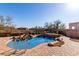 Backyard pool surrounded by a brick patio at 8041 E Teton Cir, Mesa, AZ 85207