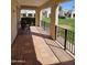 Covered patio featuring beautiful tile flooring and an open view of the lawn at 8815 W Avenida De Amigos Cir # 118, Arizona City, AZ 85123