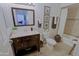 Elegant bathroom with a framed mirror, drawers, and a bathtub with shower at 9990 N Scottsdale Rd # 2020, Paradise Valley, AZ 85253