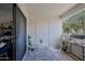 Relaxing patio featuring outdoor seating, a small table, and an exterior door for convenient access at 9990 N Scottsdale Rd # 2020, Paradise Valley, AZ 85253