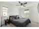 This bedroom features neutral tones, a ceiling fan, and offers comfort, style, and relaxation at 1018 S 5Th St, Avondale, AZ 85323