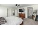 This bedroom offers carpet floors, a ceiling fan and natural light, creating a cozy retreat at 1018 S 5Th St, Avondale, AZ 85323