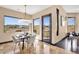 Dining room with modern chandelier, table with seating, and views of the landscape at 10224 N Azure Vista Trl, Fountain Hills, AZ 85268